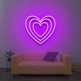 Heart LED neon sign in stylish purple, an elegant and durable lighting option for romantic settings or celebrations.