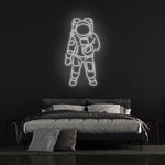 Astronaut Neon Sign – LED space-themed wall decor for kids' rooms, providing a cozy glow and inspiring imaginative play.