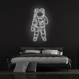 Astronaut Neon Sign – LED space-themed wall decor for kids' rooms, providing a cozy glow and inspiring imaginative play.