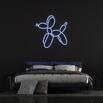 Blue LED neon light of a balloon dog, wall decor for modern home interior, glowing dog shaped neon sign.