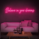 Believe in Your Dreams LED neon sign in pink, perfect for a chic and cozy lounge setting