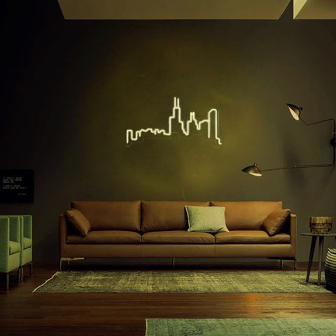 Chicago skyline neon LED wall art in warm white light displayed in a cozy living room, perfect for urban-themed interiors.