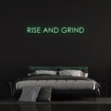 Eco-friendly Rise & Grind Neon Sign – LED wall art that adds vibrant energy to any room, designed for long-lasting performance with a clear acrylic backboard and power bank.

