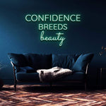 Confidence Breeds Beauty neon light sign glowing in a contemporary living room with a navy-blue theme and elegant furnishings.