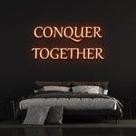 Conquer Together orange neon sign for modern bedroom lighting and unique wall art.