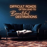 Difficult Roads Often Lead to Beautiful Destinations LED neon sign in orange