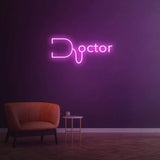 Pink doctor LED neon sign on purple wall with stylish seating and modern ambiance, neon healthcare wall art.