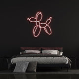 Dog balloon LED neon sign in vibrant red, artistic wall decoration for contemporary bedrooms. Adds a creative touch to interior spaces.