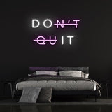 Don't Quit pink and white LED neon sign for bedroom wall lighting, perfect for inspirational home decor.