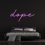 Dope LED neon sign in a script font, perfect for enhancing bedroom decor with a stylish and modern touch.