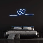Double heart blue neon wall sign perfect for bedrooms and intimate spaces.