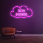 Dream Bigger pink neon sign in a cloud shape, great for chic and inspiring room decor