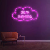 Dream Bigger pink neon sign in a cloud shape, great for chic and inspiring room decor
