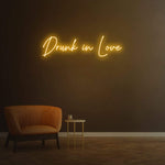 Drunk in Love warm orange
 LED neon sign adding a cozy vibe to room interiors.