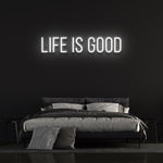 Eco-friendly 'Life is Good' neon sign, LED lights, and energy-efficient design for home or office.