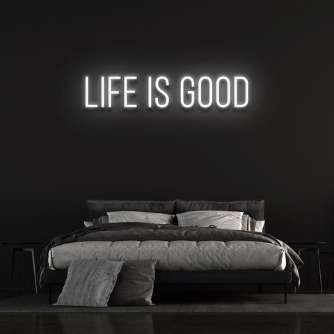 Eco-friendly 'Life is Good' neon sign, LED lights, and energy-efficient design for home or office.