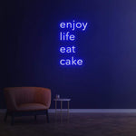 Enjoy Life Eat Cake dark blue neon LED sign for a sophisticated and calming aesthetic in lounges or cafes.