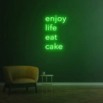 Enjoy Life Eat Cake green neon LED sign for eco-friendly decor in dining areas or cafes.