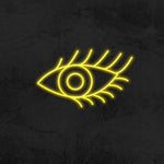 Modern Eye with lashes LED sign, an elegant neon light for salon or bedroom wall decor.