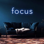 Focus LED neon sign, motivational wall decor for boosting productivity at home or office.