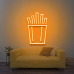 "Vibrant French fries LED neon sign radiating orange light, a bold decor element for restaurants or game rooms.