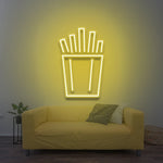 Stylish French fries LED neon sign in yellow light, great for kitchens or dining areas, creating a warm and inviting atmosphere.