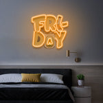 Friday LED neon sign mounted above a cozy bedroom wall, adding a vibrant and playful glow to the modern decor setup.