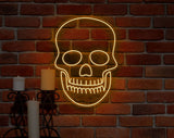 Glowing skull LED neon sign, adding an edgy, vibrant touch to home or office decor.