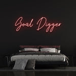 Inspirational "Goal Digger" neon sign for wall decor, ideal for motivating spaces like gyms, offices, or homes with bright LED lighting.