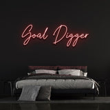 Inspirational "Goal Digger" neon sign for wall decor, ideal for motivating spaces like gyms, offices, or homes with bright LED lighting.
