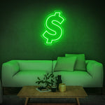 Green dollar sign neon light decor illuminating a contemporary living room, perfect for creative home or office ambiance.