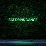 Green LED neon sign reading Eat Drink Dance for restaurants, bars, and party venues.
