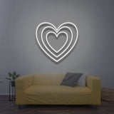 Heart LED neon sign in crisp white, a modern and eco-friendly decor piece to brighten your space with love.