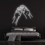 "Hold Hands Neon Sign – Romantic LED wall decor, a thoughtful gift for anniversaries or birthdays, adding warmth and charm to any room.