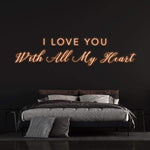I Love You with All My Heart Neon Sign, a heartfelt addition to bedroom decor, creating a cozy and romantic ambiance.