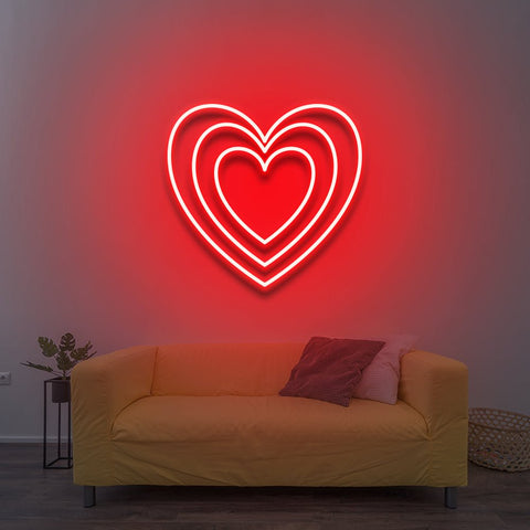 Heart LED neon sign in radiant red, a romantic and warm wall decor perfect for home or events.