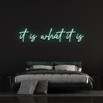 It Is What It Is LED Neon Sign in refreshing light green, energy-efficient wall decor for bedrooms, living rooms, or offices.