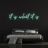 It Is What It Is LED Neon Sign in refreshing light green, energy-efficient wall decor for bedrooms, living rooms, or offices.