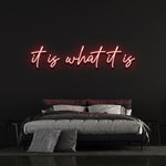 It Is What It Is LED Neon Sign in vibrant red, perfect for modern home or office decor, adding trendy style and a vibrant glow to any space.