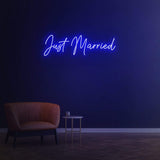 Just Married LED neon sign in blue – vibrant and eye-catching wall decor for weddings, receptions, or special events, adding flair to your celebration.