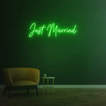 Just Married LED neon sign in green – stylish wall decor for weddings, receptions, and romantic celebrations, creating a festive atmosphere.