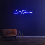 Stylish Lash Obsession LED wall sign, designed to elevate beauty salon interiors with vibrant lighting.