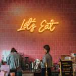 Let's Eat LED neon sign – Fun and lively kitchen decor perfect for restaurants, cafes, and home kitchens.