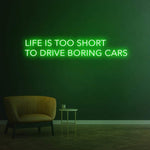 Life Is Too Short to Drive Boring Cars LED neon sign, automotive wall decor for car enthusiasts.