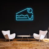 Light blue Cheesecake LED neon sign, designed for chic wall decor and hospitality spaces.