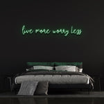 Eco-friendly Live More Worry Less LED neon sign for creating a positive environment in your space.