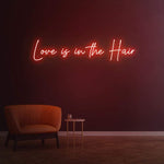 Love Is in the Hair LED Neon Sign – Stylish wall décor for hair salons, creating a trendy and inviting atmosphere.