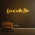 Love Is in the Hair Neon Light – Playful and modern LED wall décor for hair salons, adding charm and style.