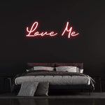 Love Me LED Neon Sign – Playful and stylish wall decor for bedrooms, living rooms, or events, adding charm and warmth to your space.