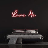 Love Me LED Neon Sign – Playful and stylish wall decor for bedrooms, living rooms, or events, adding charm and warmth to your space.